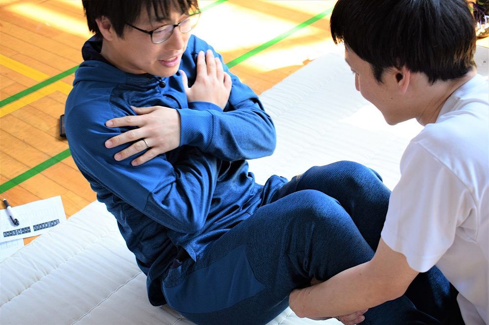 2人1組での上体起こしの測定